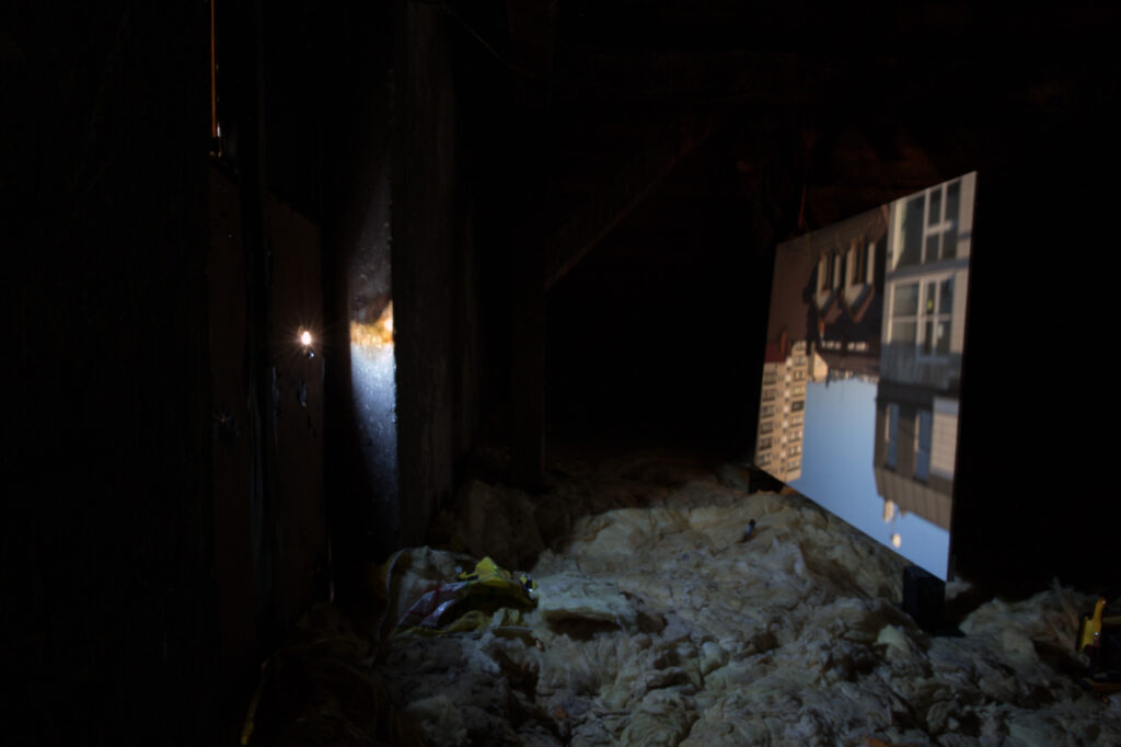 Upside-down architectural image displayed on a panel in the attic space of the Salt Storage.